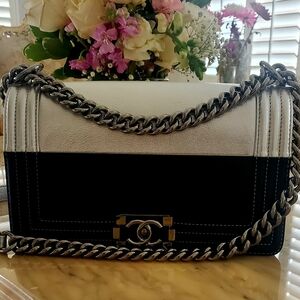 Stylish Black Handbag with Silver Accents.